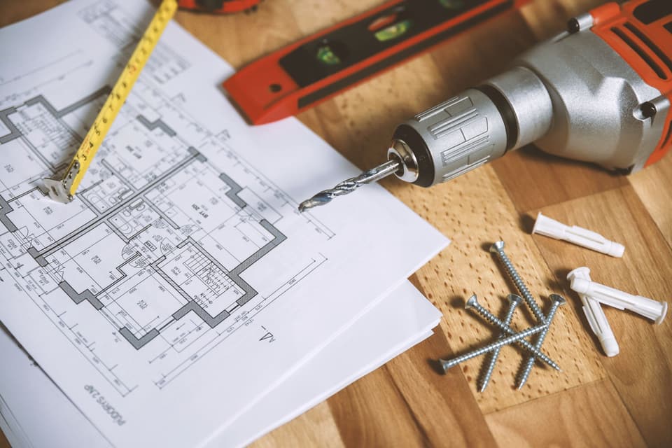 Floor plans with a level and drill